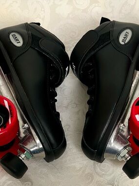 Black Riedel Roller Skates with Red Wheels
